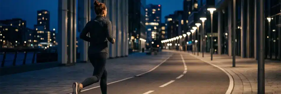 Runner at night representing Spotify Running Mode and BPM-based running music